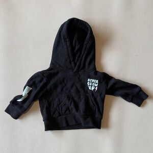 Kids Black Hoodie with 'Never Grow Up' Design